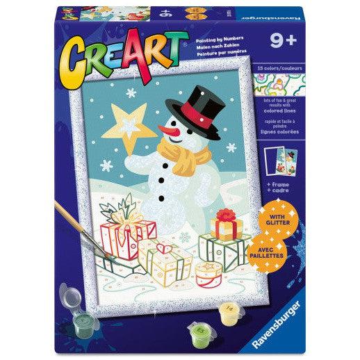 The CreArt paint-by-numbers kit for ages 9+ offers screen-free downtime with a spectacular snowman, adorned with gifts and a star. Instructions are available in English, German, and French. The kit includes a frame and glitter to add extra sparkle to your masterpiece.