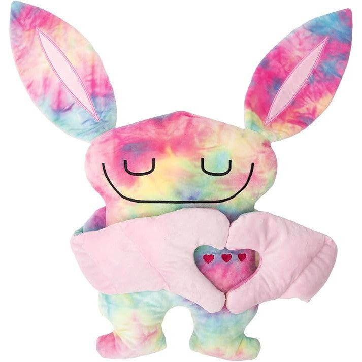 Meet the Bumpas, a weighted plush toy adorned in mesmerizing pink, yellow, and blue tie-dye colors. This delightful creature boasts large ears and a heartwarming smile while embracing a soft pink heart adorned with three charming red hearts. Perfect for snuggles!