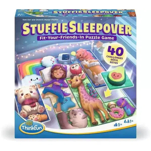 Box and components of "Stuffie Sleepover" puzzle game featuring colorful animal and character pieces.