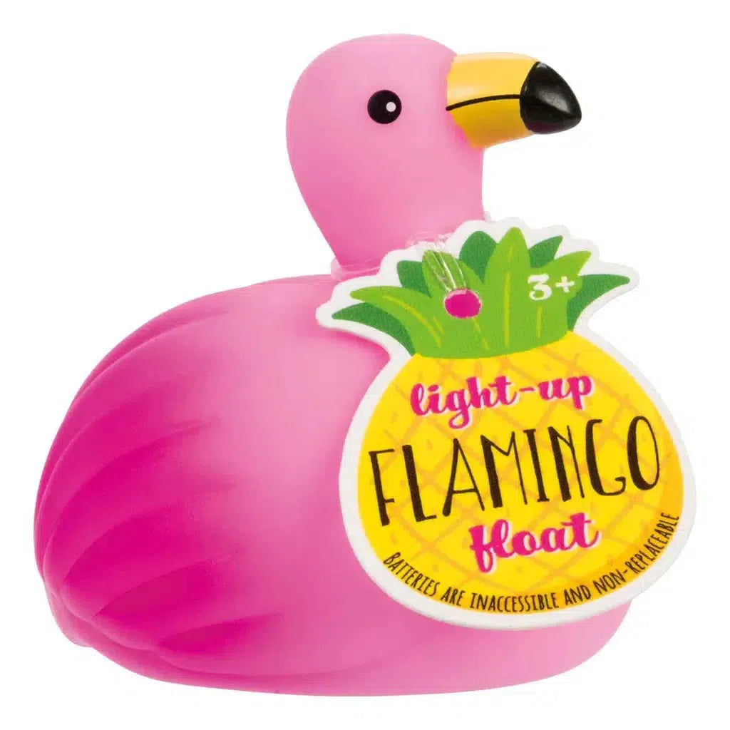 Display box with pink floating flamingo bath toys. The vibrant box, in bright pink and green, boasts "Color Changing Lights" that promise to make your bath time floatin’ fabulously magical!.