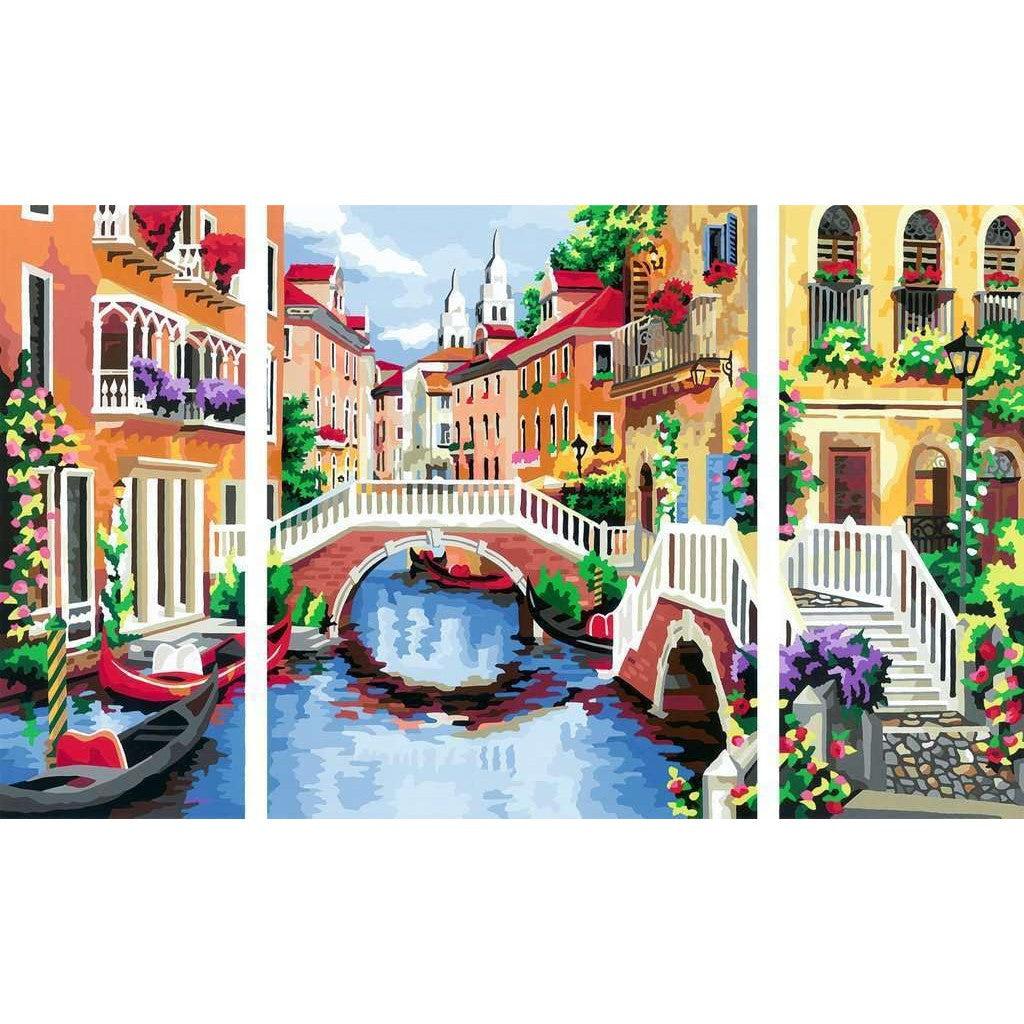 Experience the charm of a quaint town in this vibrant "Venetian Dreams" scene, where colorful boats glide along a canal adorned with flowers and arched bridges under a perfect blue sky. Perfect for those inspired by Ravensburger CreArt, this depiction captures serene beauty in every brushstroke.