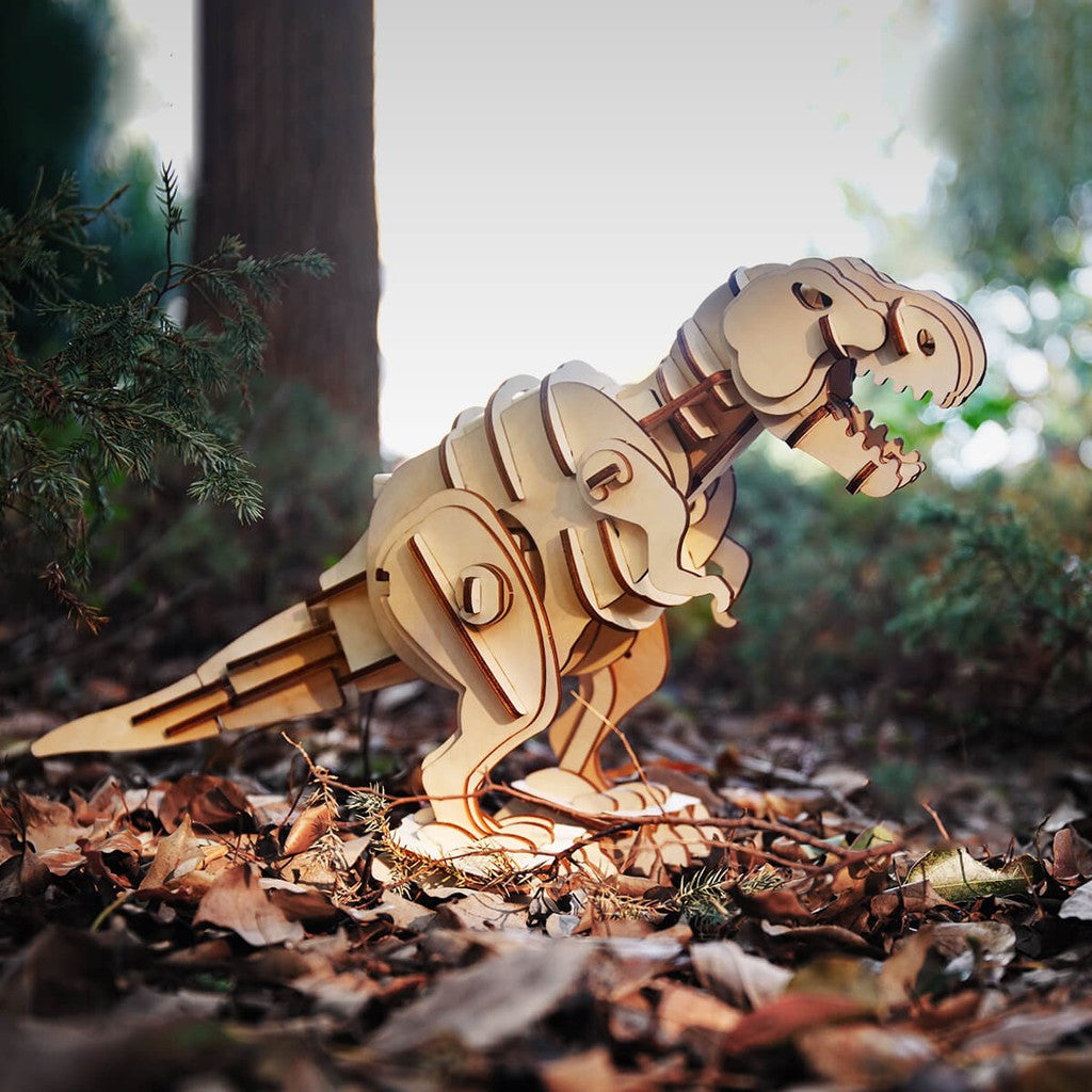 A wooden T Rex model standing