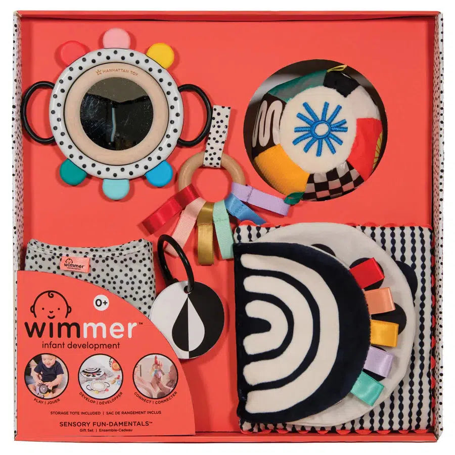 This delightful gift set of baby toys for infants includes a ball, book, mirror, and colorful rings, all designed to enhance sensory development. Labeled "Wimmer Infant Development," it's perfect for nurturing your little one's growth.